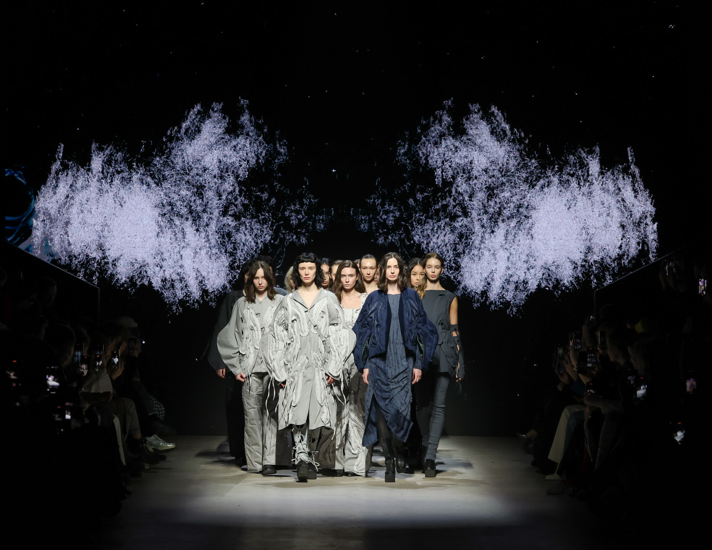 Runway show with projected visuals